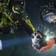 Illustration for article titled This Diver Is Cradling a 12,000-Year-Old Skull in an Underwater Cave